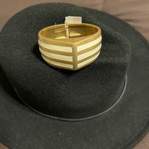 Lia Sophia bangle in gold and cream.